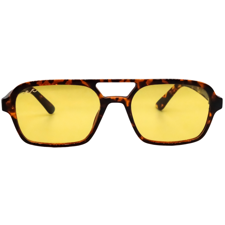 Aviator-style sunglasses with a brown and black tortoiseshell frame and yellow tinted lenses, shown against a plain white background.